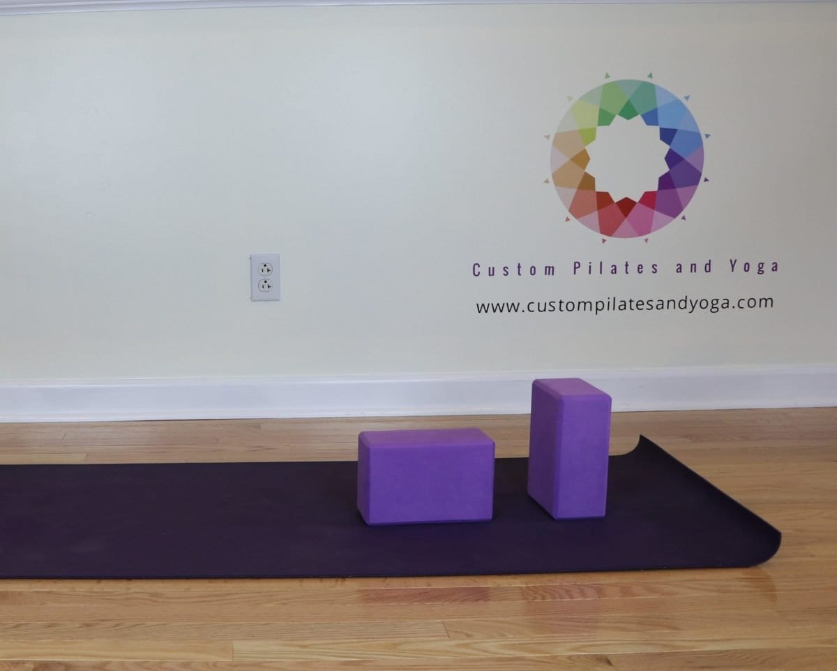 stretch your upper back with yoga blocks