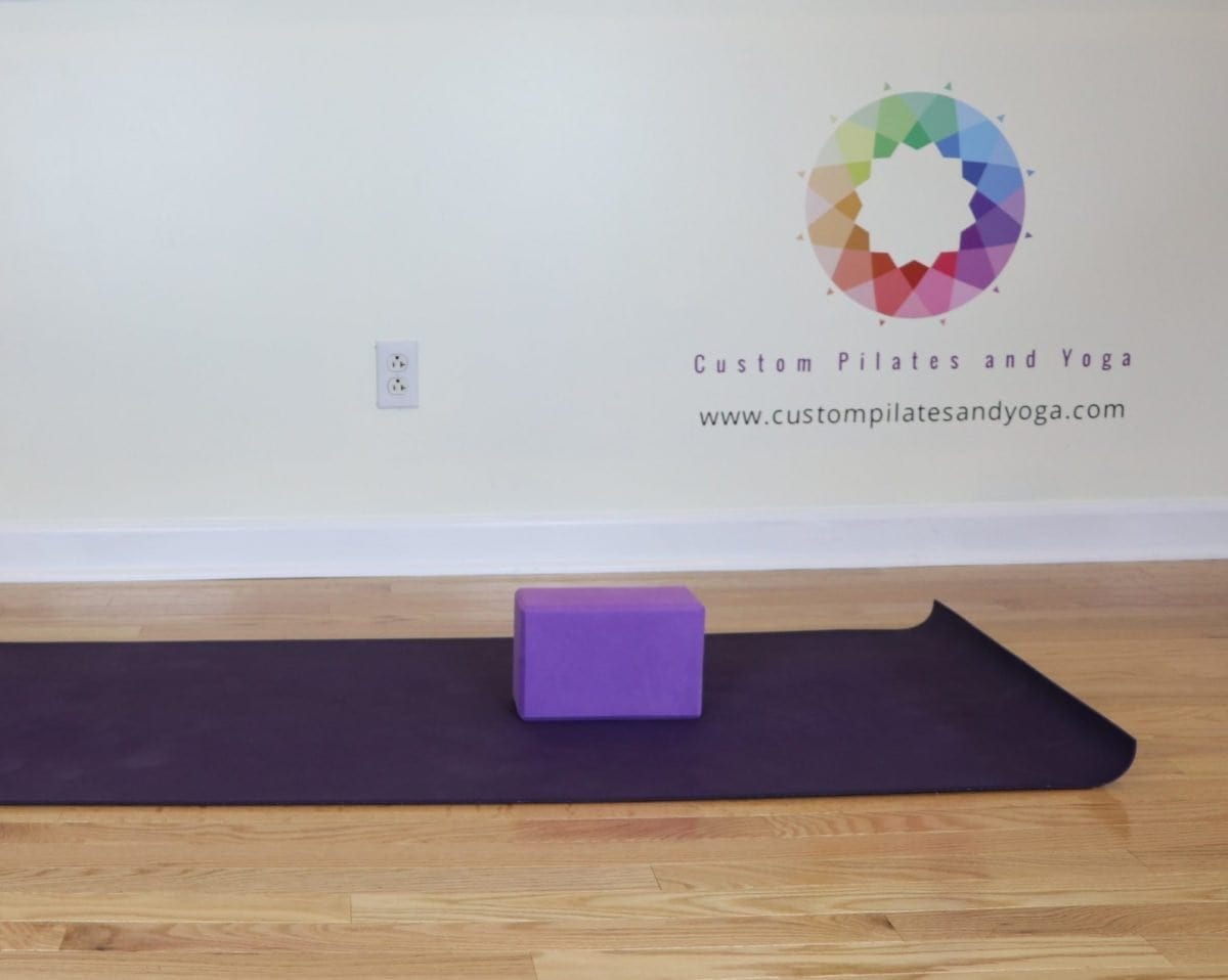 stretch your upper back with yoga blocks