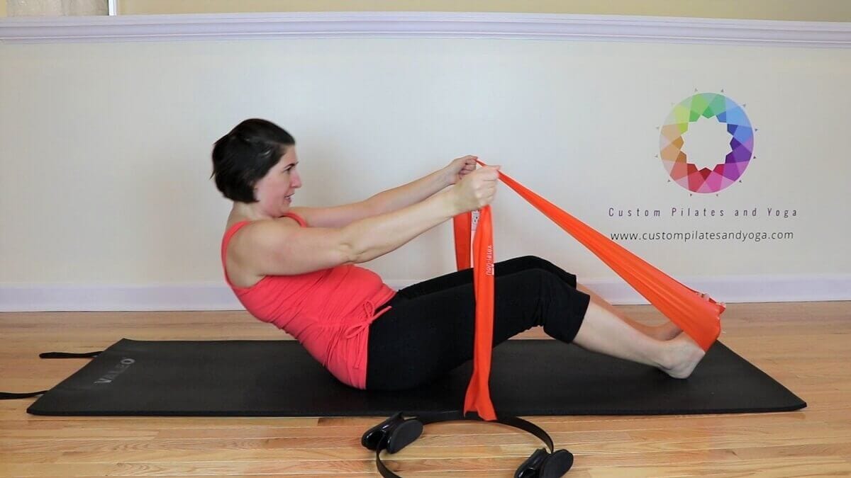 using the flex band in a pilates roll up